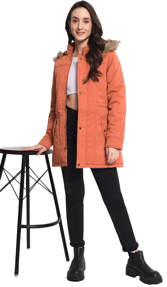 A woman wearing a peach color full sleeve long jacket featuring faux fur hood , front zip closure with snap button,practical side pockets and regular fit.