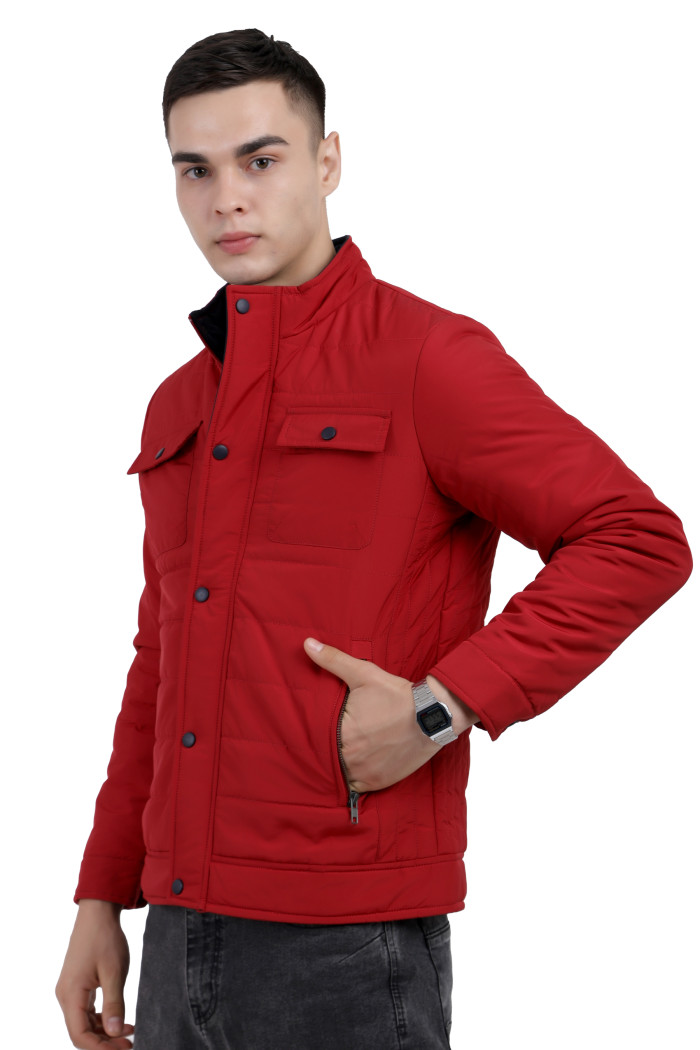 A left pose of a man wearing a Red quilted jacket with a high neck collar, zipper closure and pocket in hand designed for casual winter layering and comfort.