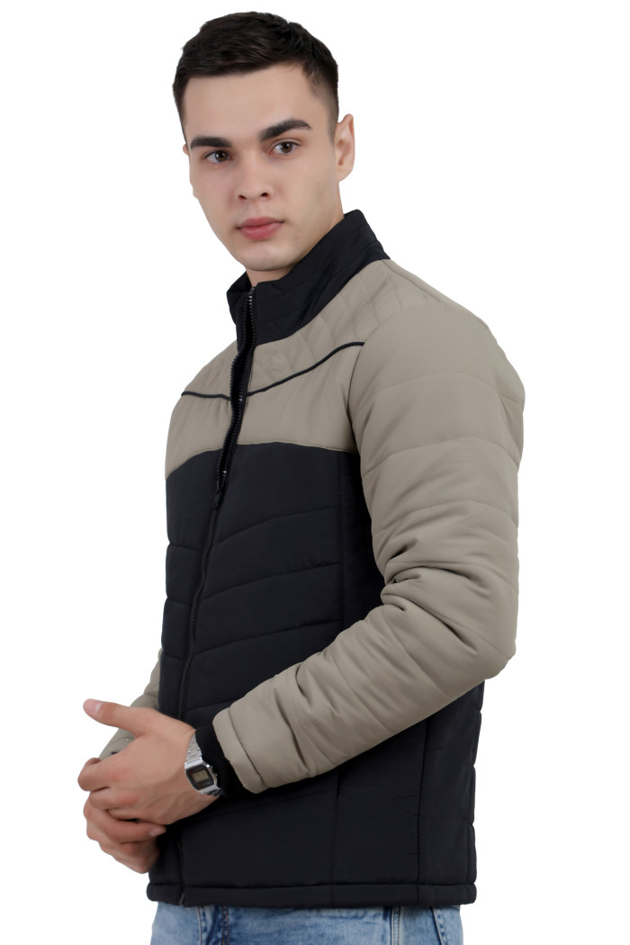 A left pose of a man wearing a Black-Camel dual Tone Quilted Jacket with mock collar, zipper closure and pocket in hand designed for casual winter layering and comfort.