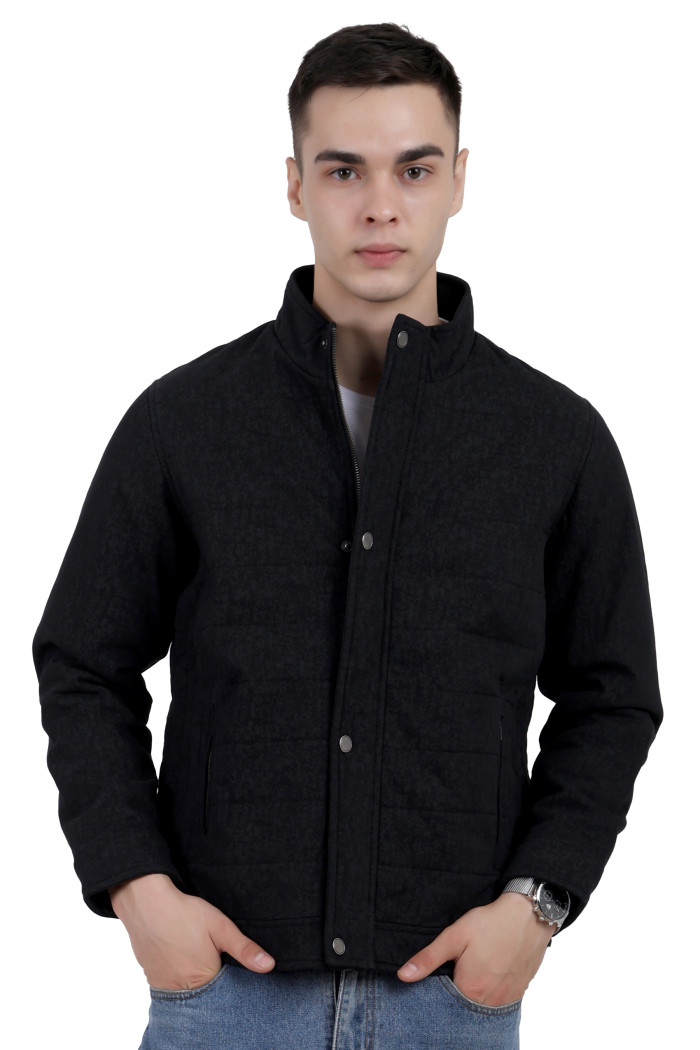 A man wearing a Black High Neck Quilted Jacket with zipper closure Button Placket, and pocket in hand designed for casual winter layering and comfort.