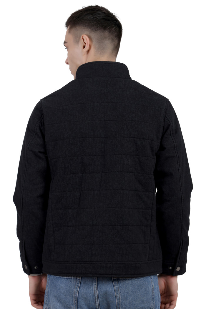 A back pose of a man wearing a Black High Neck Quilted Jacket with zipper closure Button Placket, and pocket in hand designed for casual winter layering and comfort.