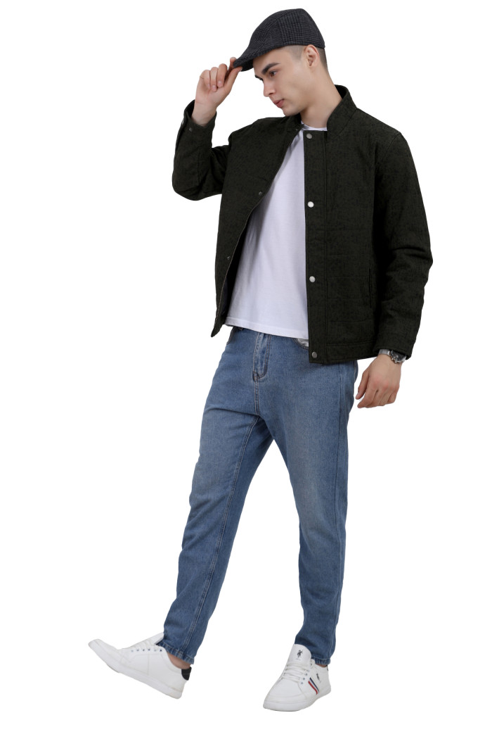 A tilted pose of a man wearing an olive High Neck Quilted Jacket with zipper closure Button Placket, and pocket in hand designed for casual winter layering and comfort.