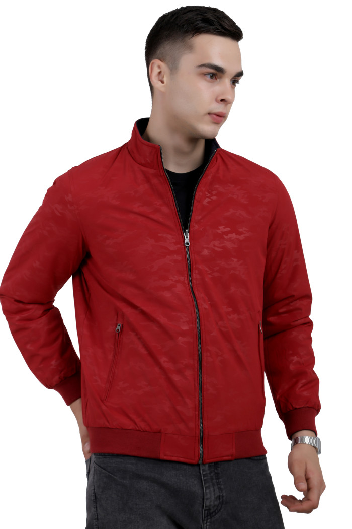 A right pose of a man wearing a Red- Navy Reversible jacket with a high neck collar, zipper closure and pocket in hand designed for casual winter layering and comfort.