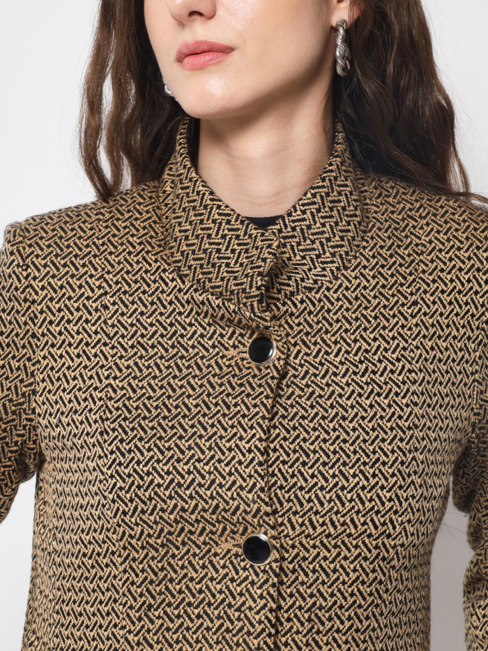 A cropped image of a woman wearing a Camel Long Coat with High neck collar, button closure and pocket in hand designed for formal and casual winter layering and comfort.