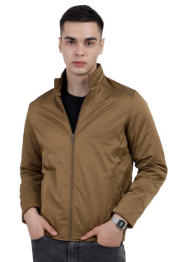 A man wearing a Khaki Riding jacket with a high collar neck, zipper closure and pocket in hand designed for casual winter layering and comfort.