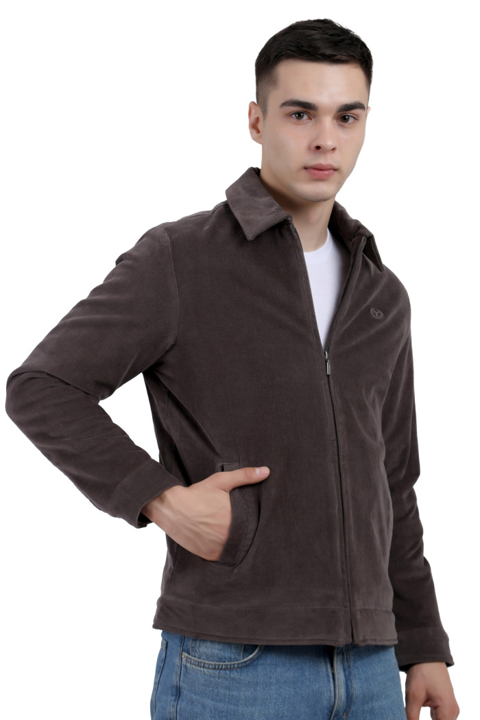 A left pose of a man wearing a Dark Grey Corduroy jacket with a collar neck, zipper closure and pocket in hand designed for casual winter layering and comfort.