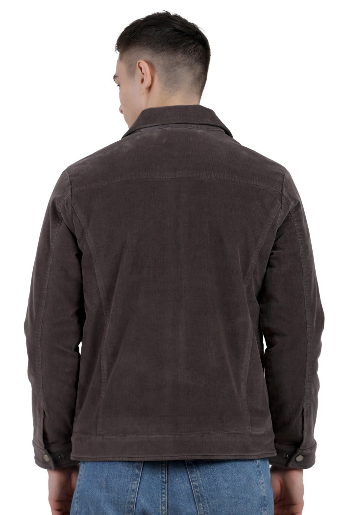 A back pose of a man wearing a Dark Grey Corduroy jacket with a collar neck, zipper closure and pocket in hand designed for casual winter layering and comfort.