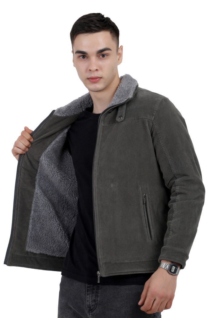 A right pose of a man wearing a Pista washed Corduroy jacket with a collar neck, zipper closure and pocket in hand designed for casual winter layering and comfort.