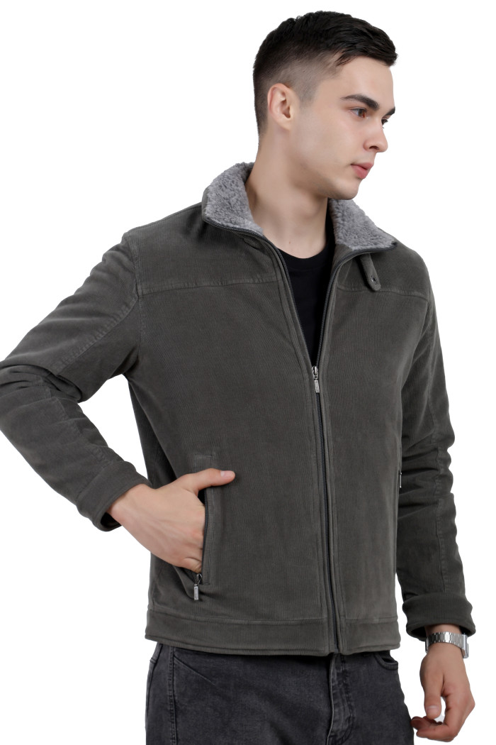 A left pose of a man wearing a Pista washed Corduroy jacket with a collar neck, zipper closure and pocket in hand designed for casual winter layering and comfort.