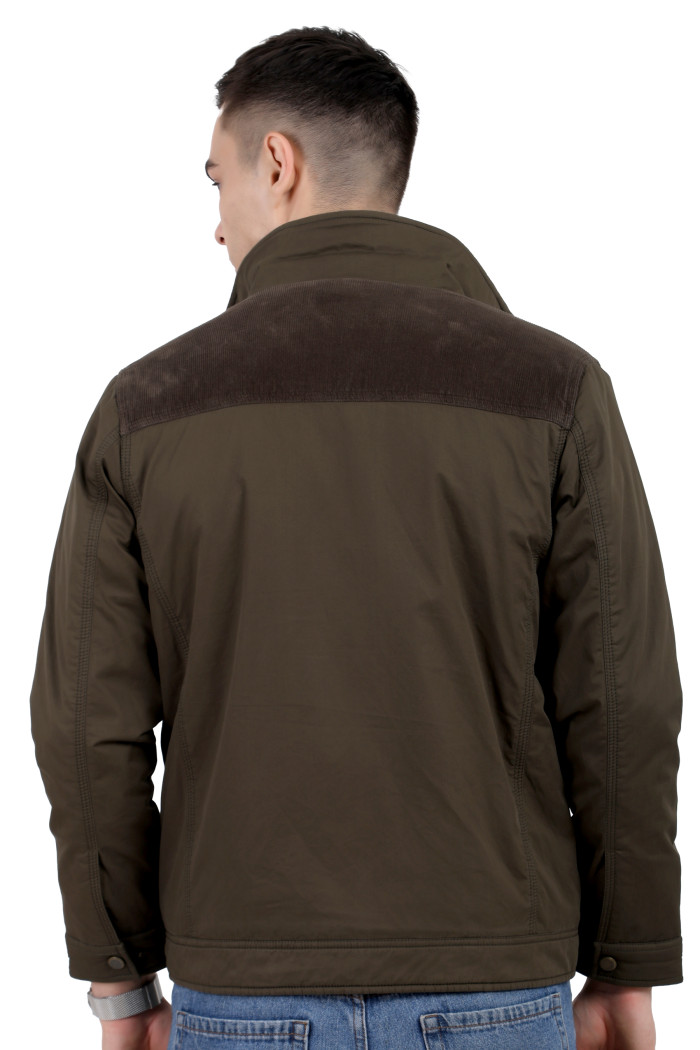 A back pose of a man wearing an Olive cotton jacket with a collar neck, zipper closure and pocket in hand designed for casual winter layering and comfort.