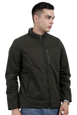 A man wearing a Dark Olive cotton jacket with a collar neck, zipper closure and pocket in hand designed for casual winter layering and comfort.