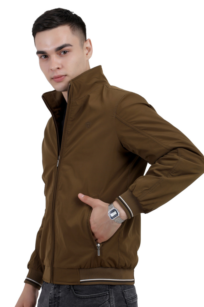 A right pose of a man wearing a Khaki polyester jacket with a collar neck, zipper closure and pocket in hand designed for casual winter layering and comfort.