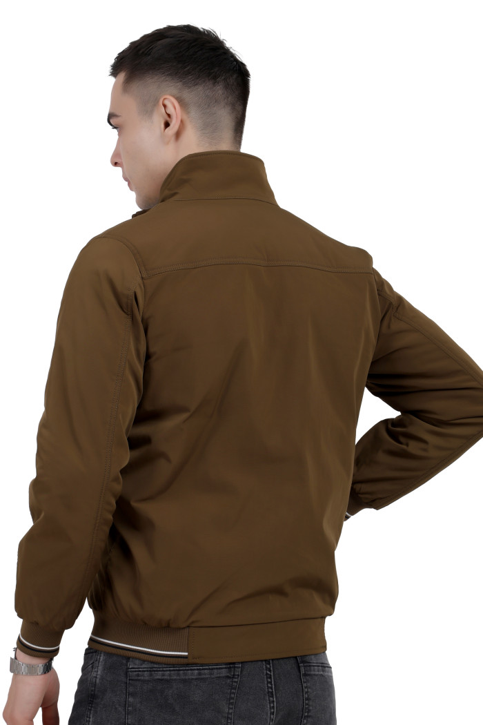 A back pose of a man wearing a Khaki polyester jacket with a collar neck, zipper closure and pocket in hand designed for casual winter layering and comfort.