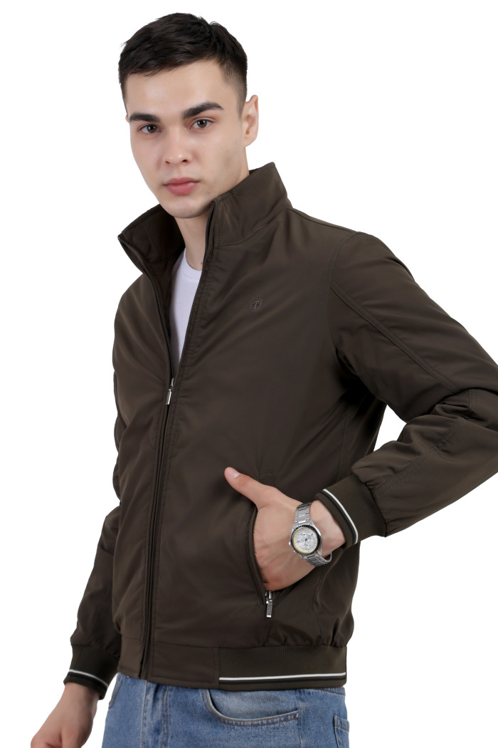 A right pose of a man wearing an Olive polyester jacket with a collar neck, zipper closure and pocket in hand designed for casual winter layering and comfort.