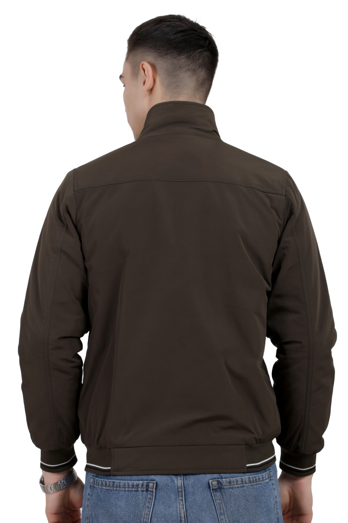 A back pose of a man wearing an Olive polyester jacket with a collar neck, zipper closure and pocket in hand designed for casual winter layering and comfort.