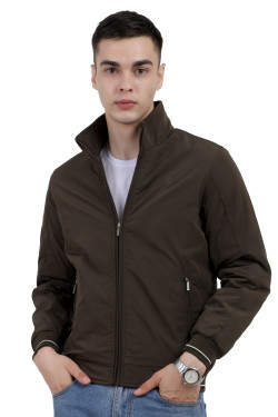 A man wearing an Olive polyester jacket with a collar neck, zipper closure and pocket in hand designed for casual winter layering and comfort.