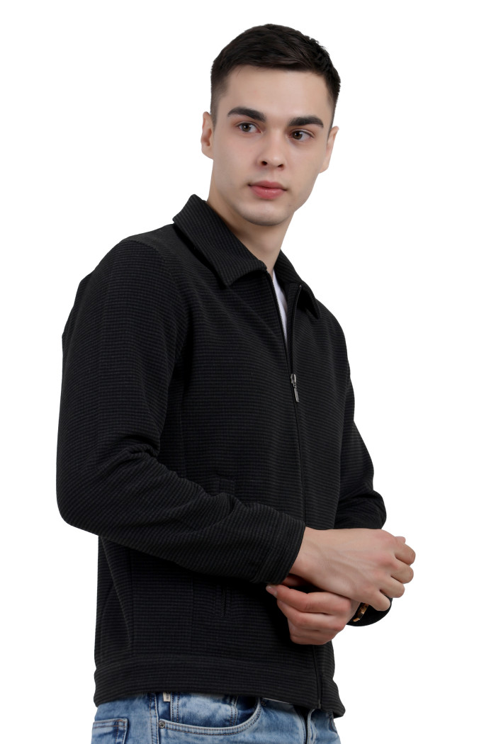 A left pose of a man wearing a Black Tweed Shacket with a collar neck, zipper closure and pocket in hand designed for casual winter layering and comfort.