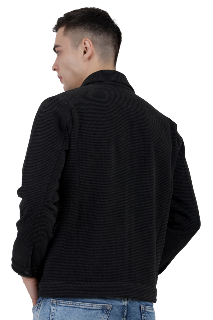 A back pose of a man wearing a Black Tweed Shacket with a collar neck, zipper closure and pocket in hand designed for casual winter layering and comfort.