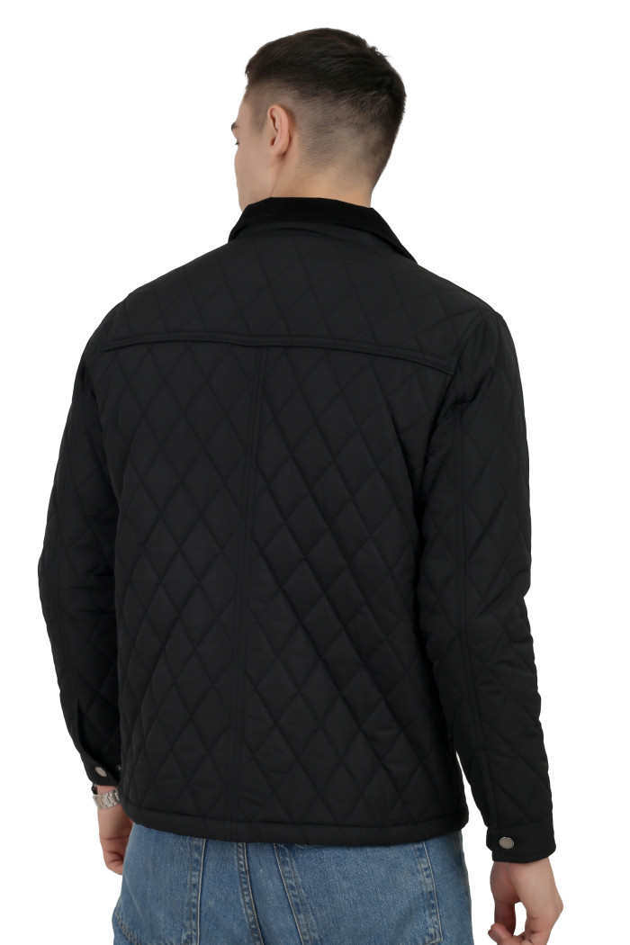 A back pose of a man wearing a Black quilted jacket with a collar neck, zipper closure and pocket in hand designed for casual winter layering and comfort.