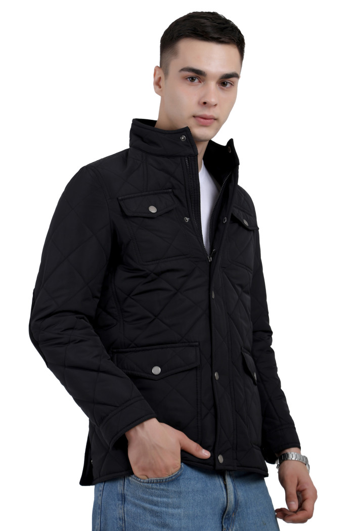 A right pose of a man wearing a Black quilted jacket with a collar neck, zipper closure and pocket in hand designed for casual winter layering and comfort.