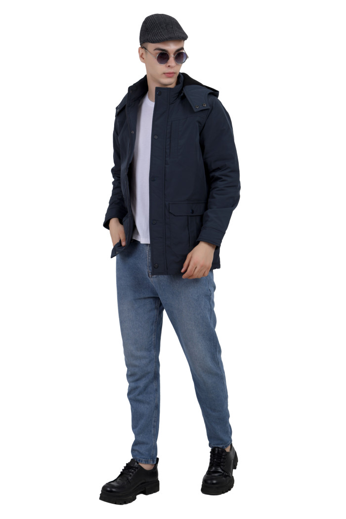 A tilted pose of a man wearing a Navy High Neck chester Jacket with zipper closure Button Placket, and pocket in hand designed for casual winter layering and comfort.