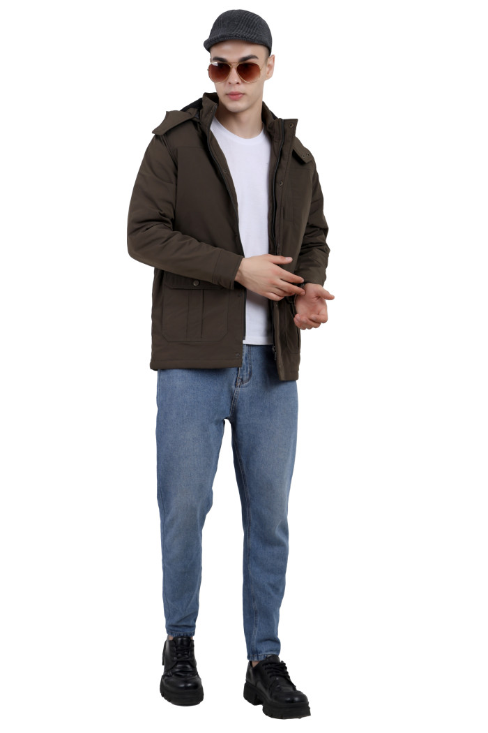 A tilted pose of a man wearing an OLIVE High Neck chester Jacket with zipper closure Button Placket, and pocket in hand designed for casual winter layering and comfort.