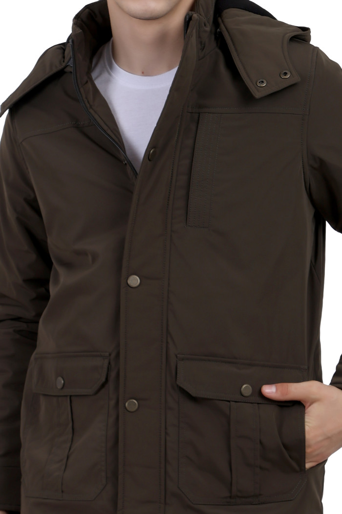 A cropped image of a man wearing an OLIVE High Neck chester Jacket with zipper closure Button Placket, and pocket in hand designed for casual winter layering and comfort.