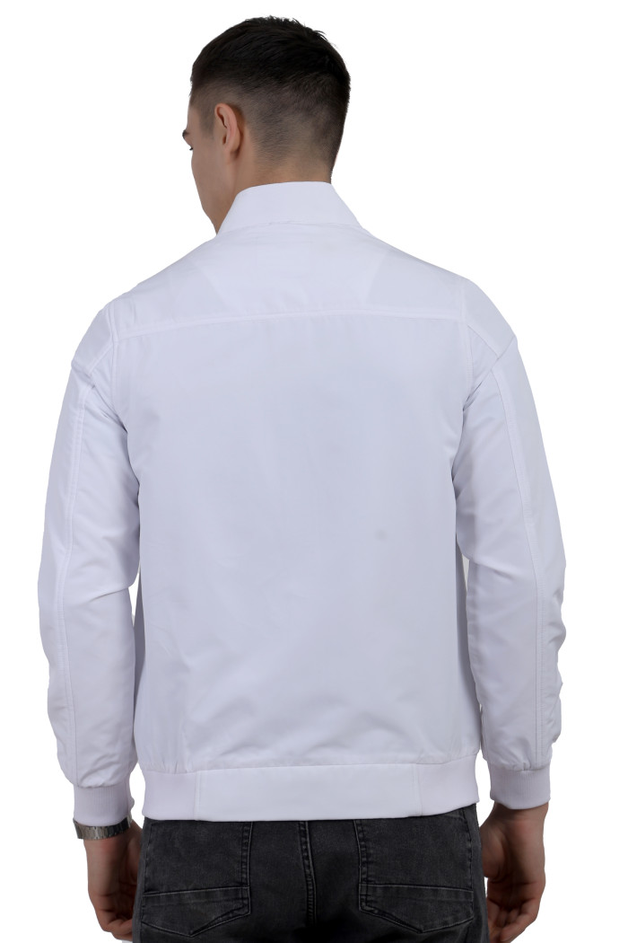 A back pose of a man wearing a White Matt Finish Lightweight Jacket with high neck collar, zipper closure and pocket in hand designed for casual winter layering and comfort.