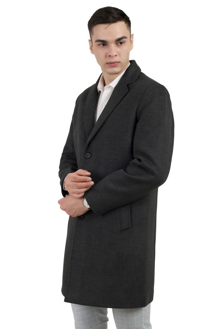 A right pose of a man wearing an Anthra Single Breasted Tweed Long Coat with a Lapel collar neck, Button closure and pocket in hand designed for casual winter layering and comfort.