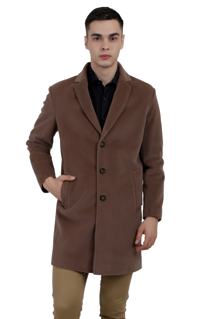 A man wearing a Mouse Single Breasted Velvet Long Coat with a Lapel collar neck, Button closure and pocket in hand designed for casual winter layering and comfort.