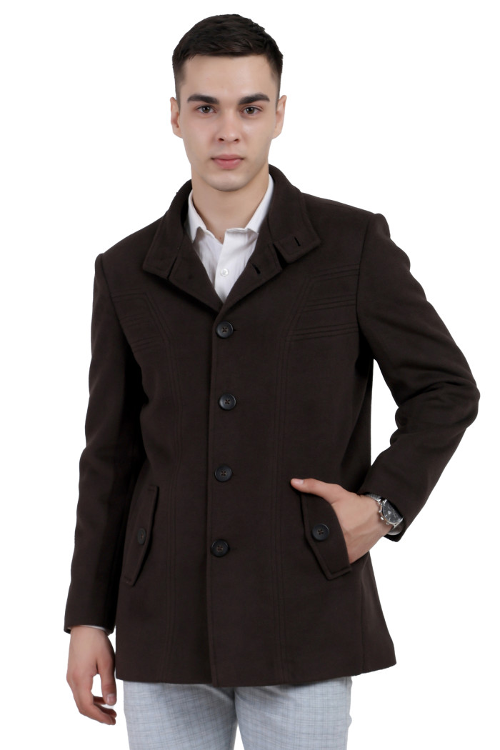 A man wearing a Brown Single Breasted Knee Length Tweed Coat with a Lapel collar neck, Button closure and pocket in hand designed for casual winter layering and comfort.