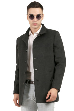 A man wearing an Anthra Single Breasted Knee Length Tweed Coat with a Lapel collar neck, Button closure and pocket in hand designed for casual winter layering and comfort.