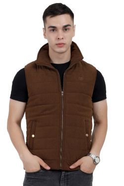 A man wearing a Khaki half jacket with a high neck, zipper closure and pocket in hand designed for casual winter layering and comfort.