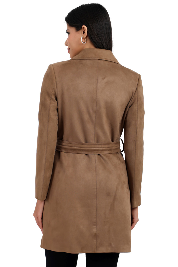 A back pose of a standing woman wearing Coatsnmore’s mouse double-breasted trench coat with a belt and bottom.