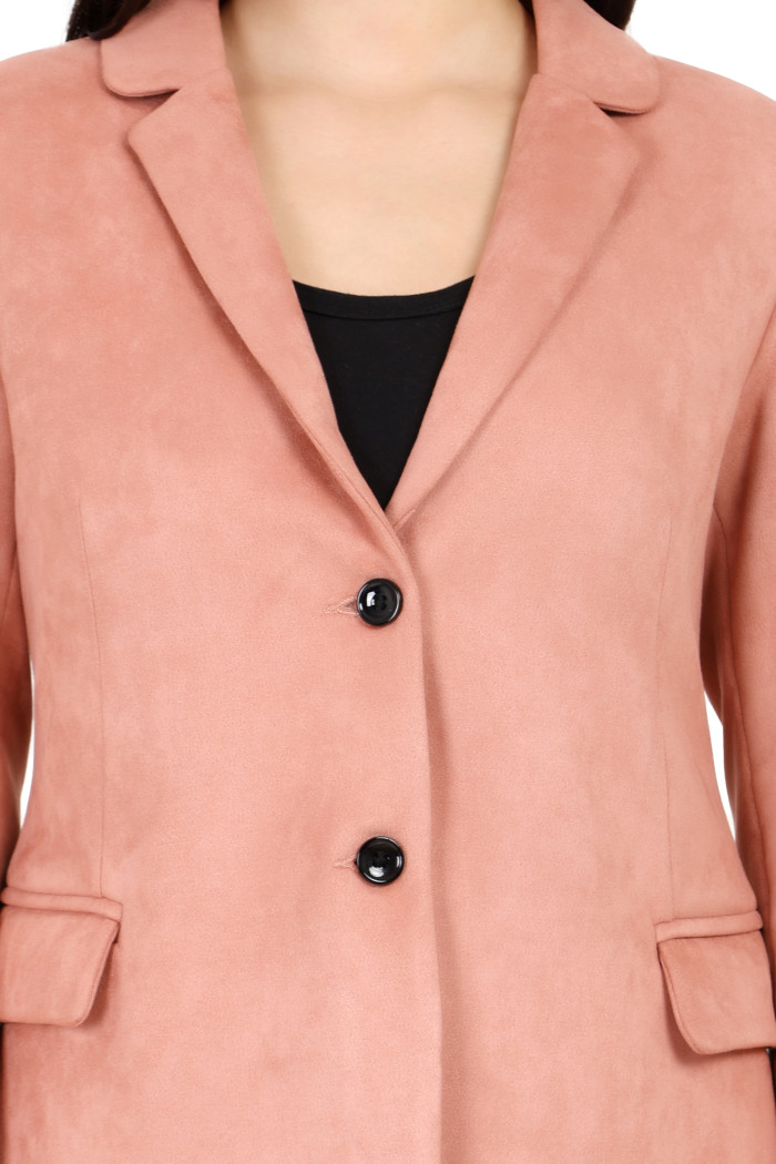 A cropped image of a woman wearing a Pink Short Coat with a lapel collar and button closure designed for formal and casual winter layering and comfort.