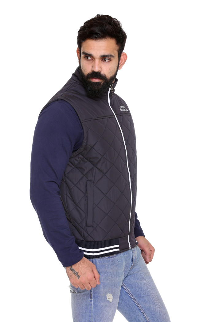 A model showcasing Men’s Quilted Sleeveless Jacket With Regular Fit thumbnail.