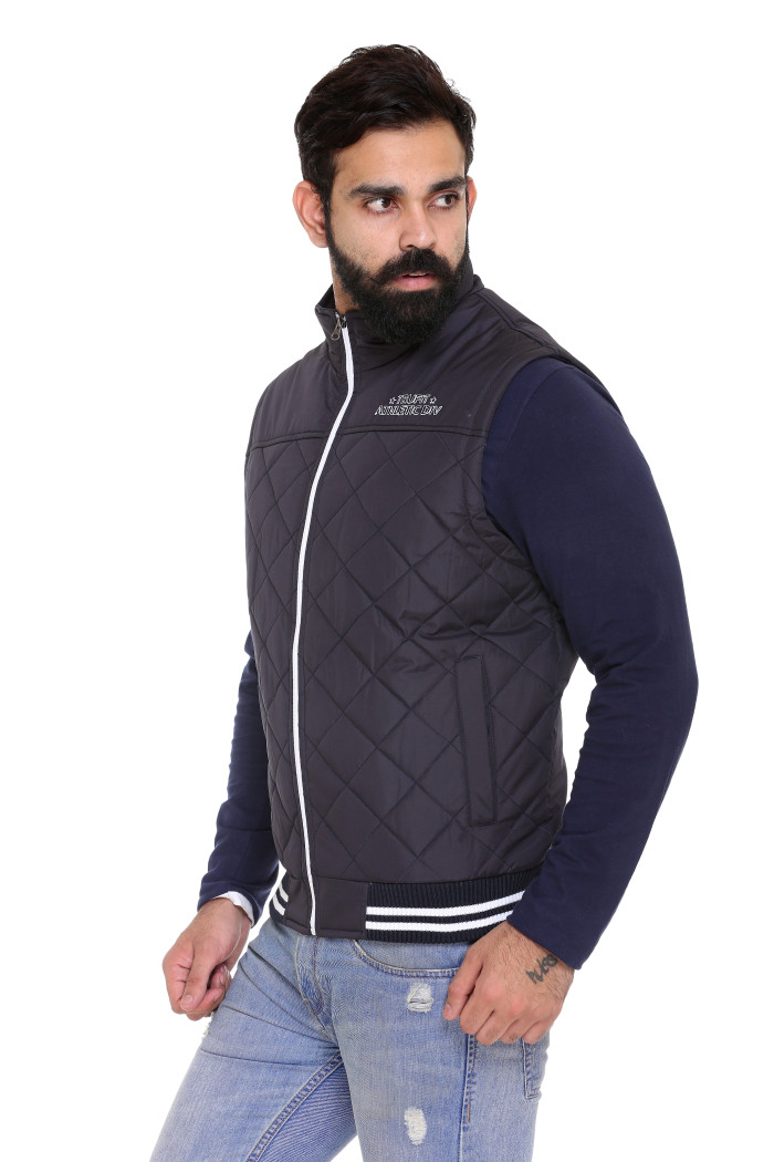 A model showcasing Men’s Quilted Sleeveless Jacket With Regular Fit thumbnail.