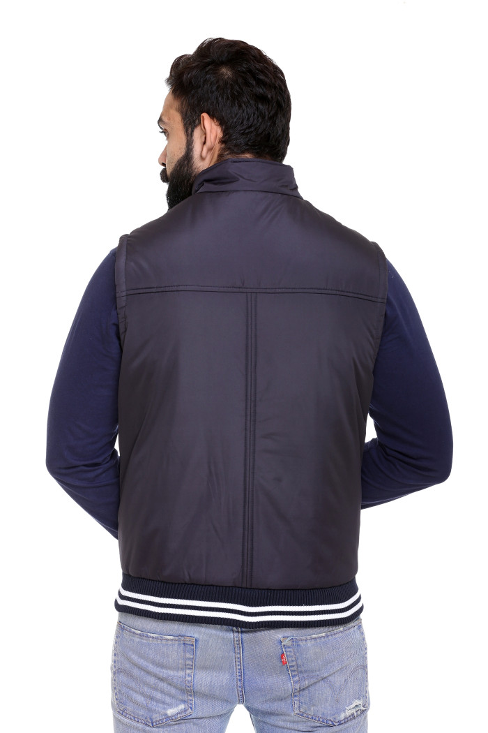 A model showcasing Men’s Quilted Sleeveless Jacket With Regular Fit thumbnail.