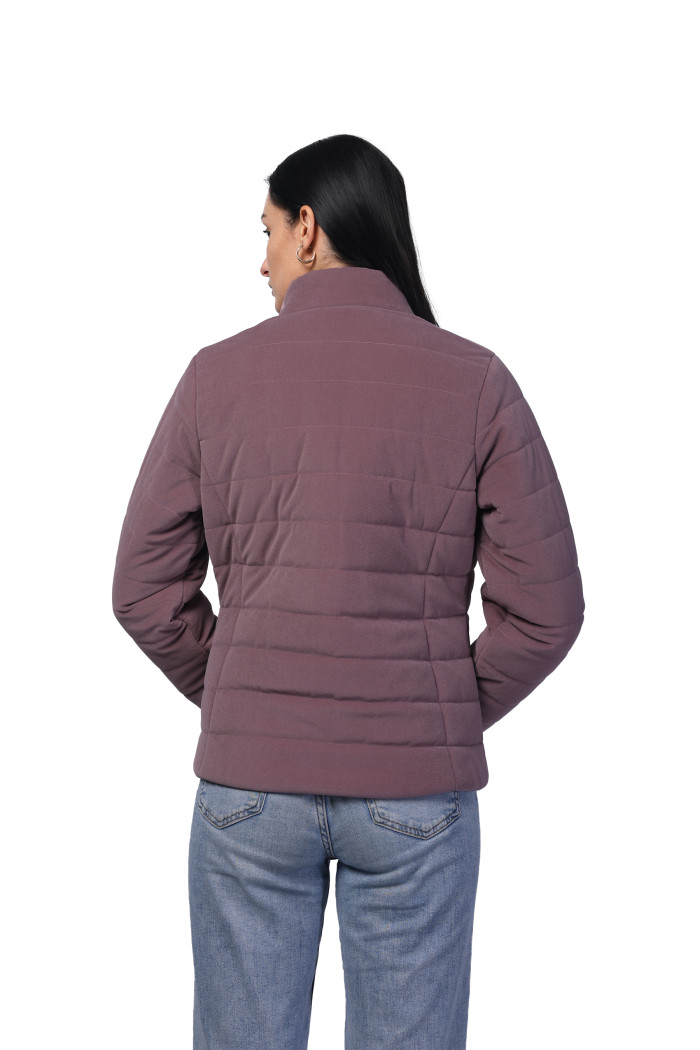 A model showcasing Women Quilted Jacket In Velvet Fabric With Concealed Zipper Pocket thumbnail.
