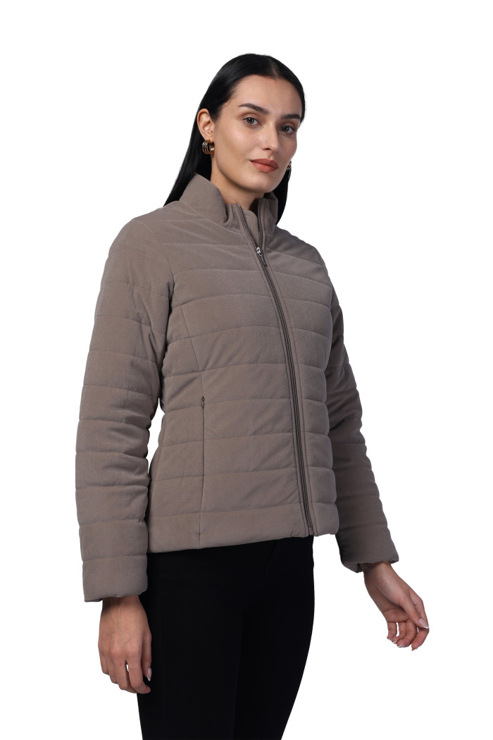 A model showcasing Women Quilted Jacket In Velvet Fabric With Concealed Zipper Pocket thumbnail.