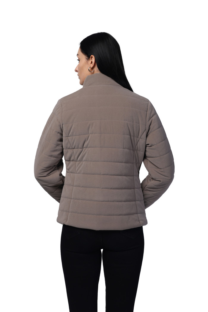 A model showcasing Women Quilted Jacket In Velvet Fabric With Concealed Zipper Pocket thumbnail.