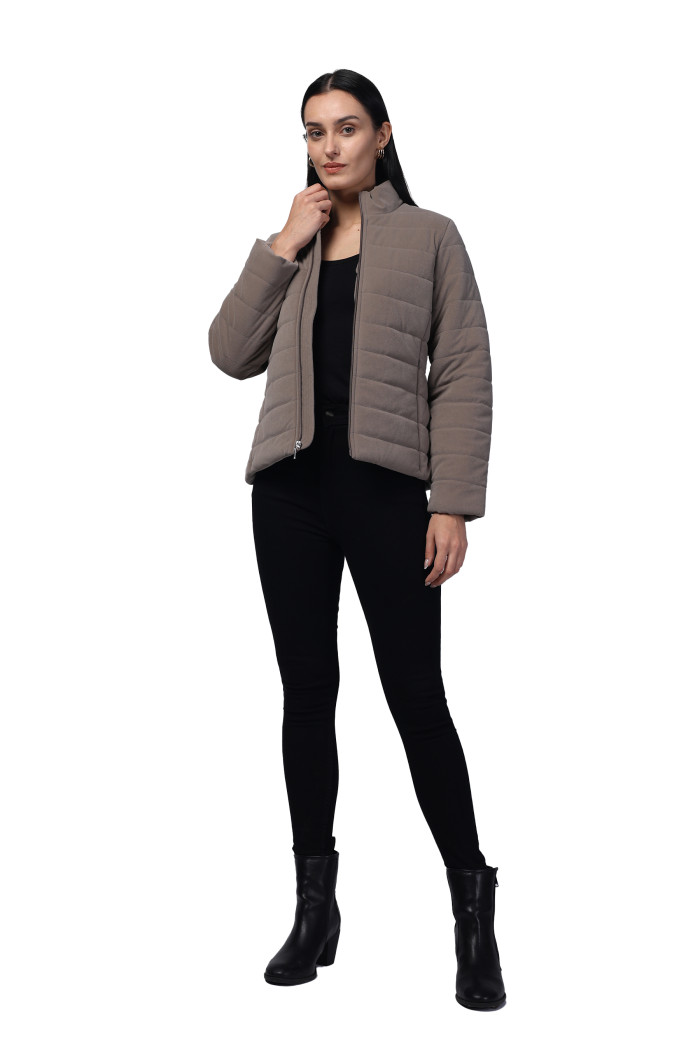 A model showcasing Women Quilted Jacket In Velvet Fabric With Concealed Zipper Pocket thumbnail.