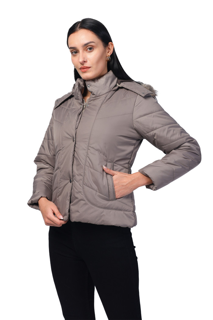 A model showcasing Women Quilted Jacket in Polyester Fabric With Removable Hood thumbnail.