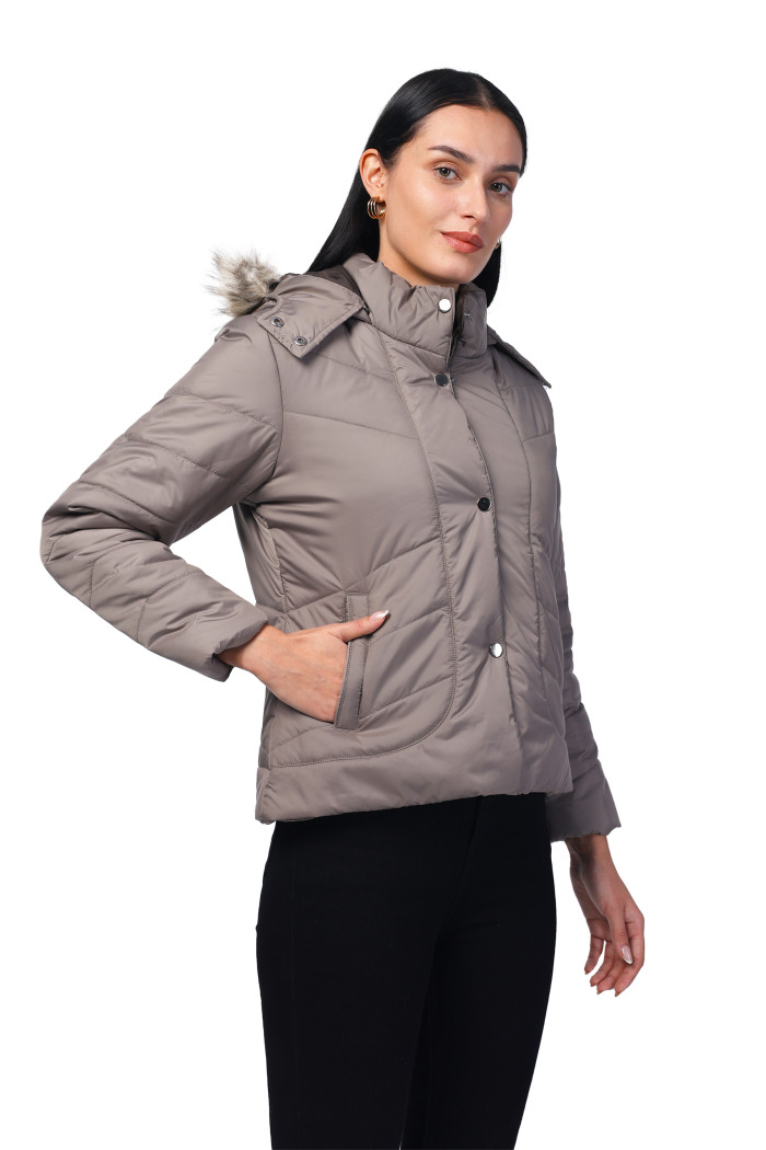 A model showcasing Women Quilted Jacket in Polyester Fabric With Removable Hood thumbnail.