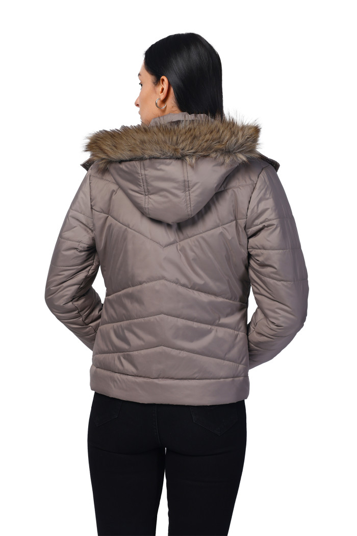 A model showcasing Women Quilted Jacket in Polyester Fabric With Removable Hood thumbnail.