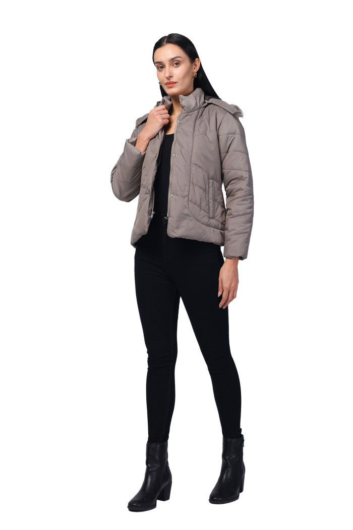 A model showcasing Women Quilted Jacket in Polyester Fabric With Removable Hood thumbnail.