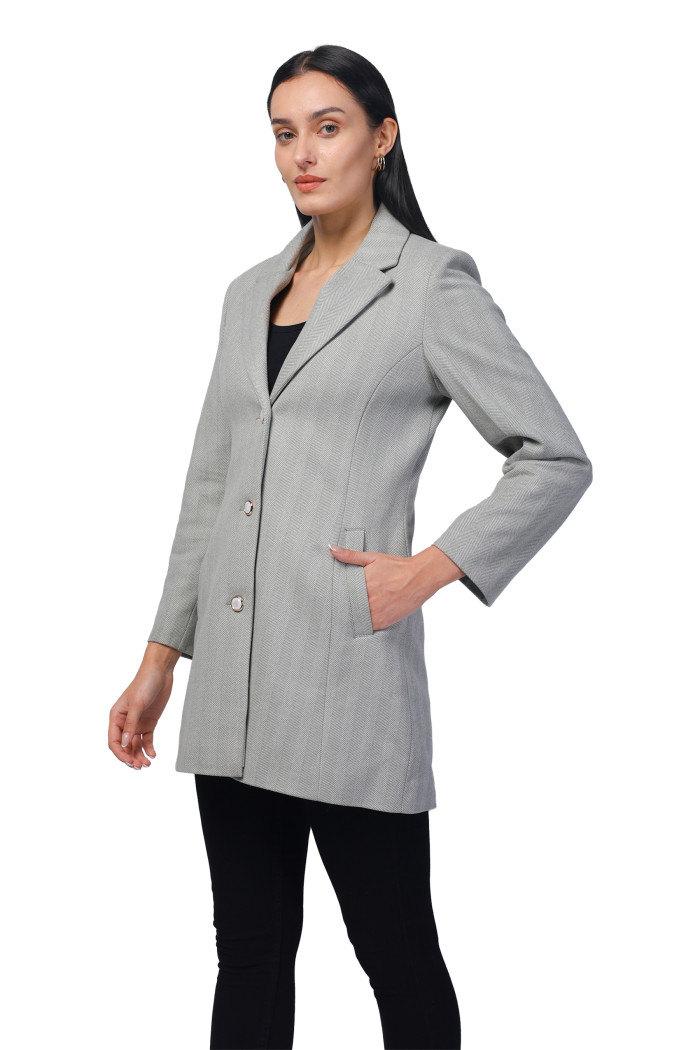 A model showcasing Women Semi Long Coat In Knitted Herringbone Tweed thumbnail.