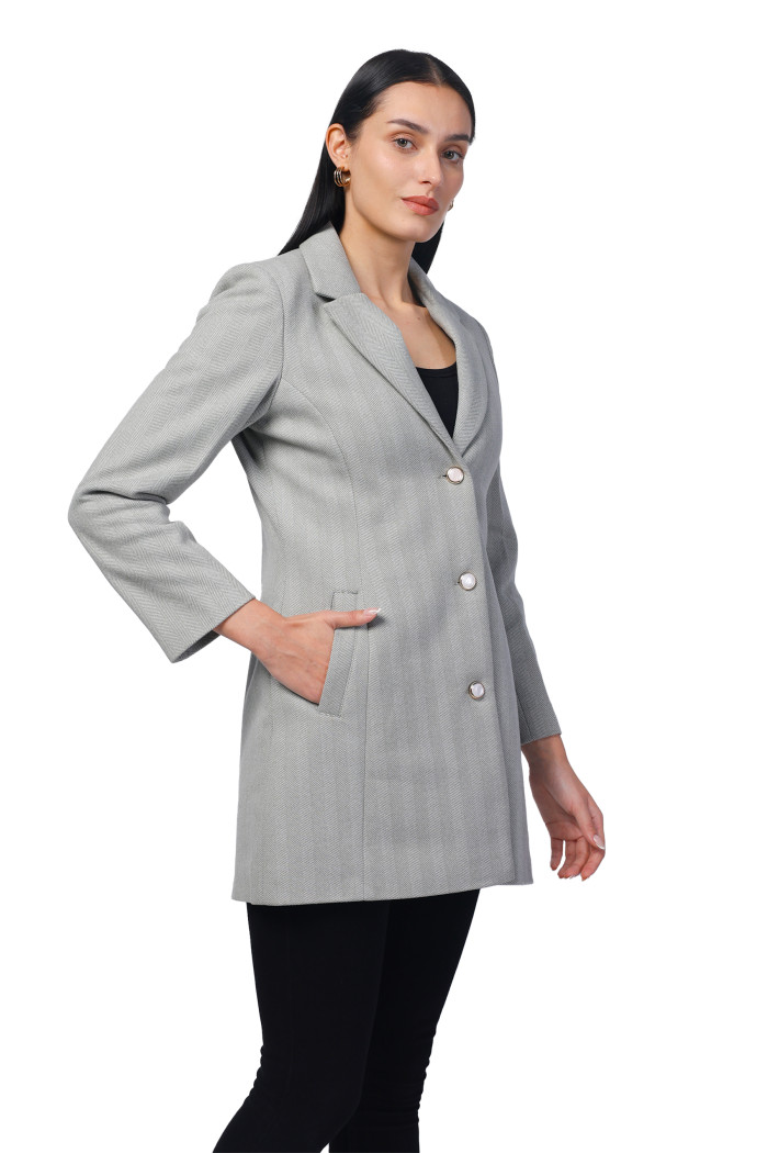 A model showcasing Women Semi Long Coat In Knitted Herringbone Tweed thumbnail.