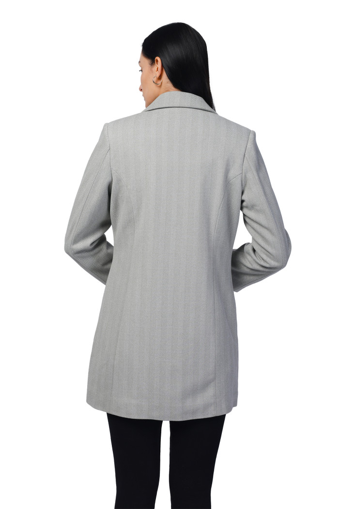 A model showcasing Women Semi Long Coat In Knitted Herringbone Tweed thumbnail.