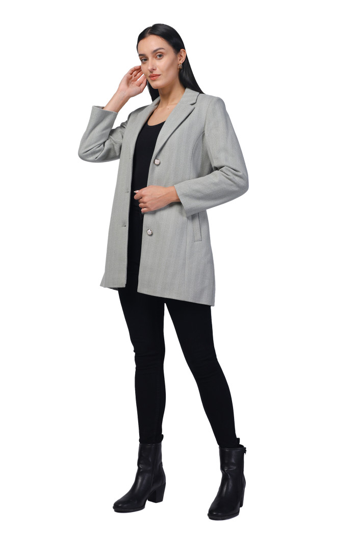 A model showcasing Women Semi Long Coat In Knitted Herringbone Tweed thumbnail.